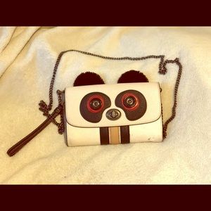 Authentic Coach Panda purse with chain strap.